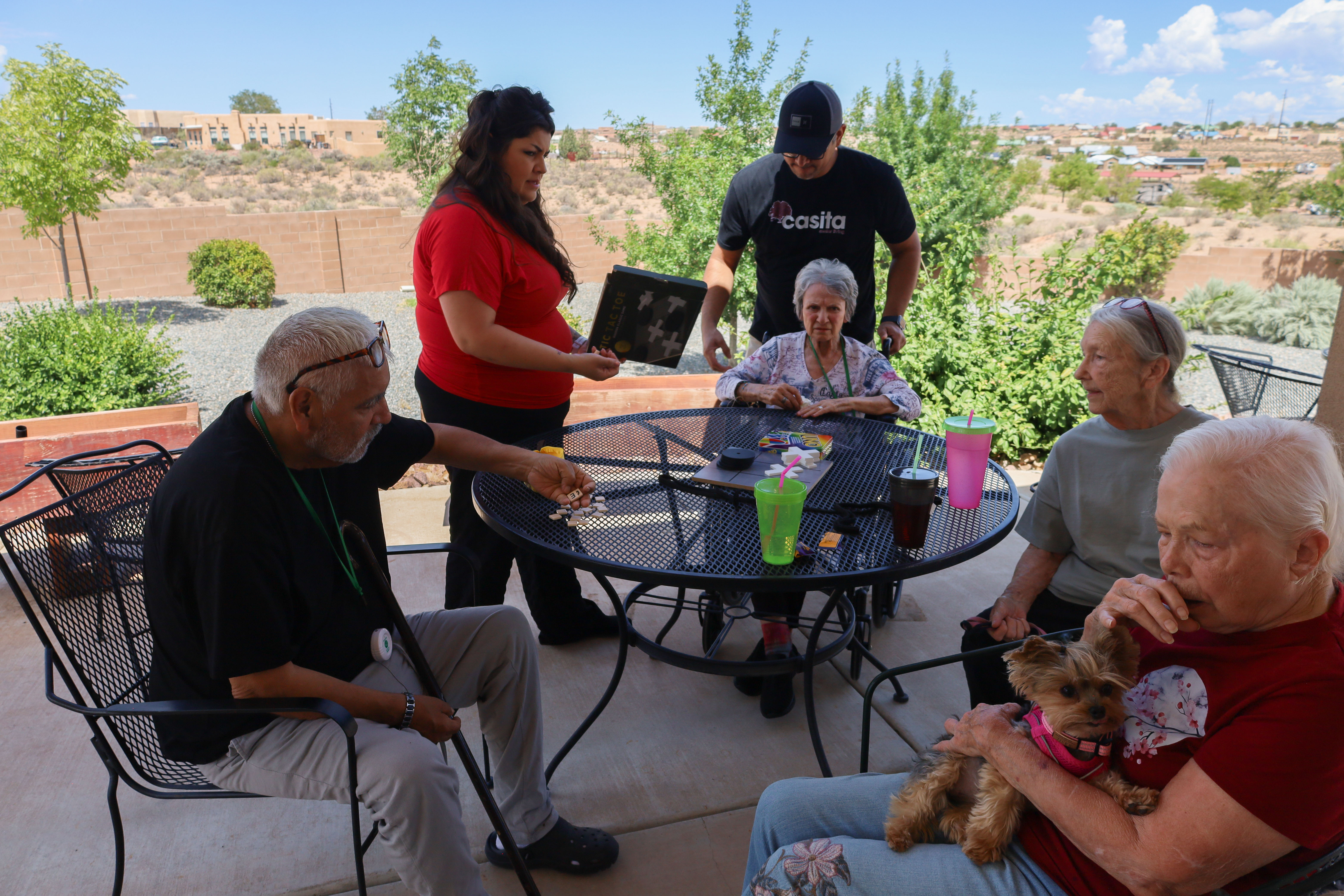 Residents and caregivers sharing an everyday moment at Casita Senior Living