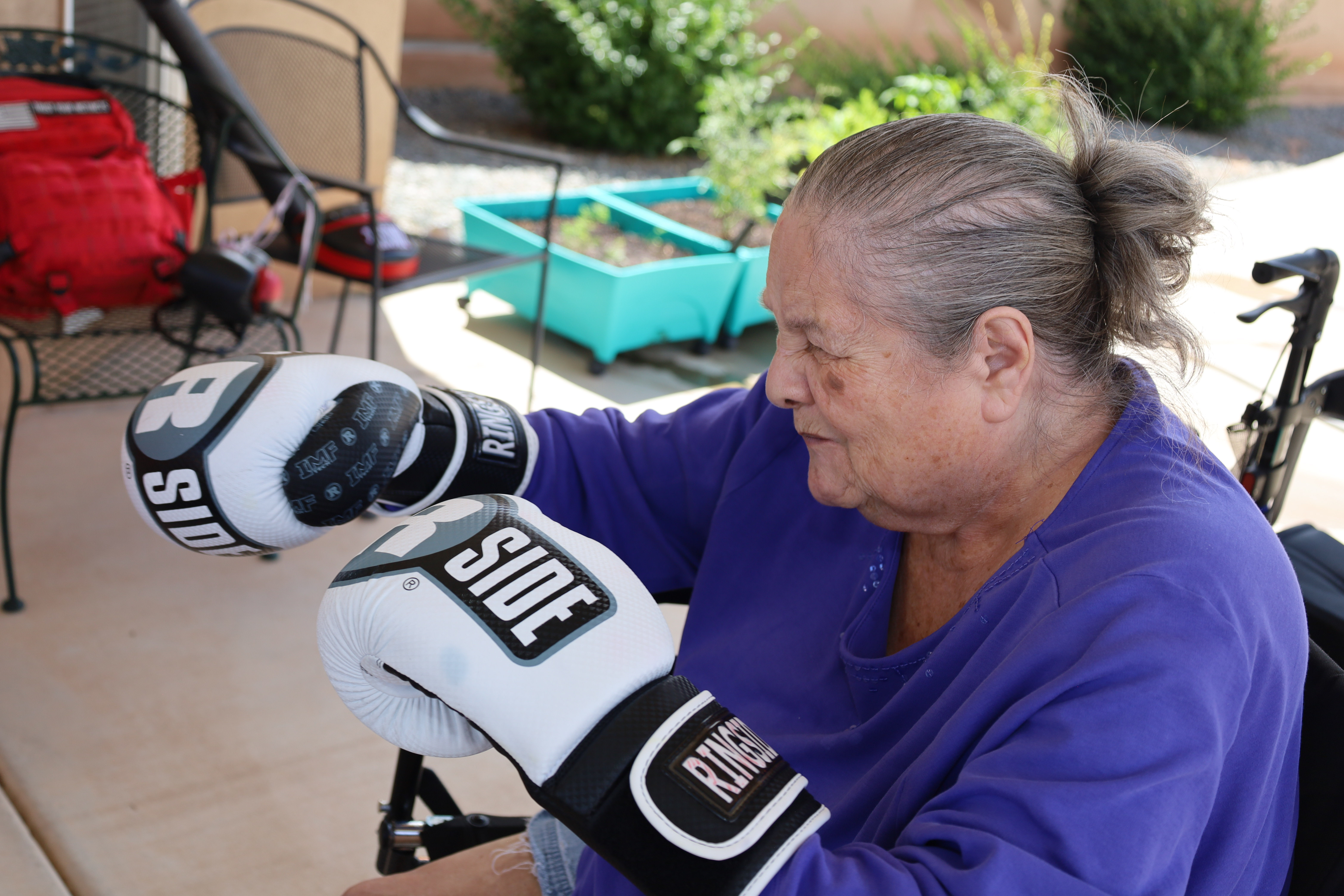 Residents and caregivers sharing an everyday moment at Casita Senior Living