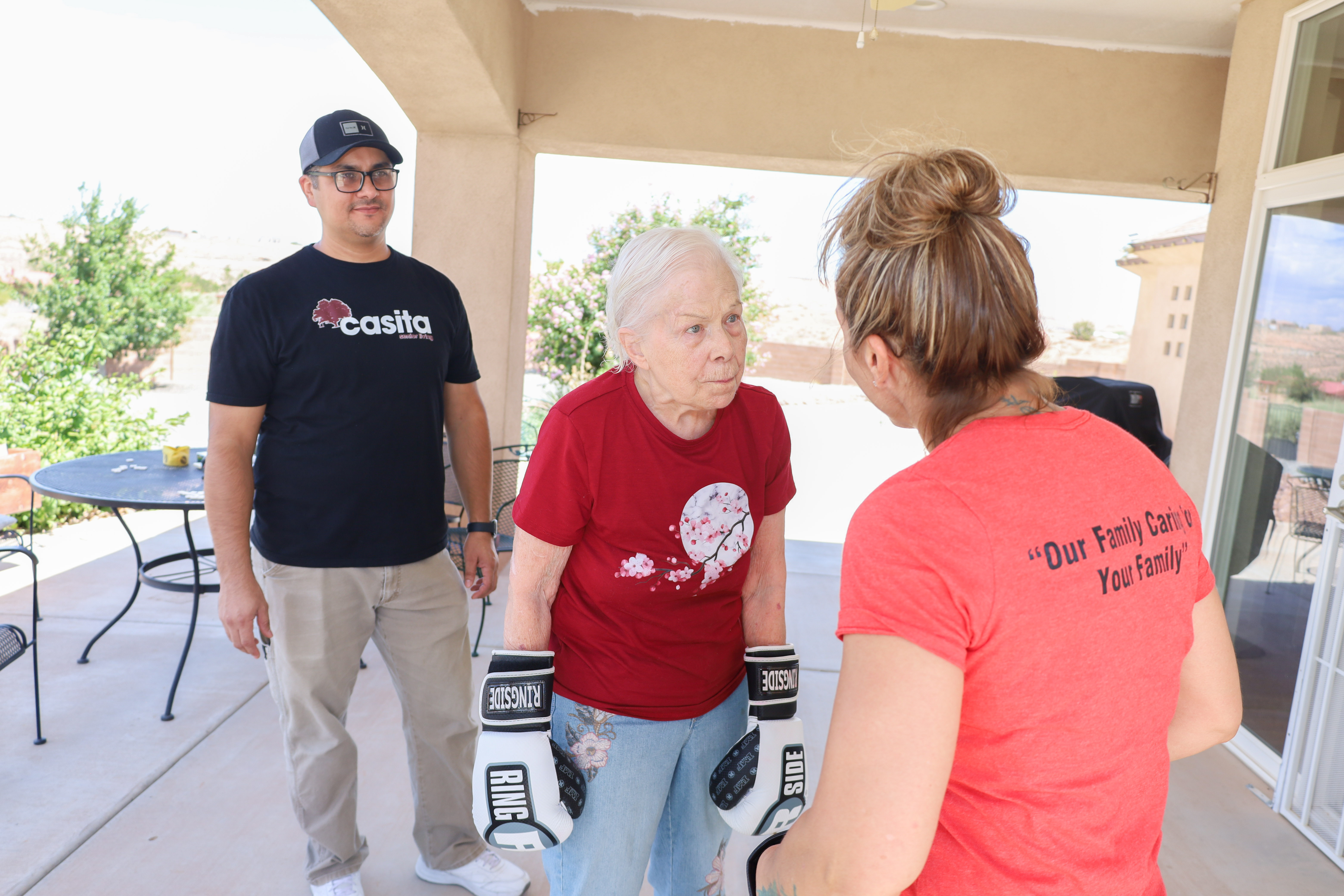 Residents and caregivers sharing an everyday moment at Casita Senior Living