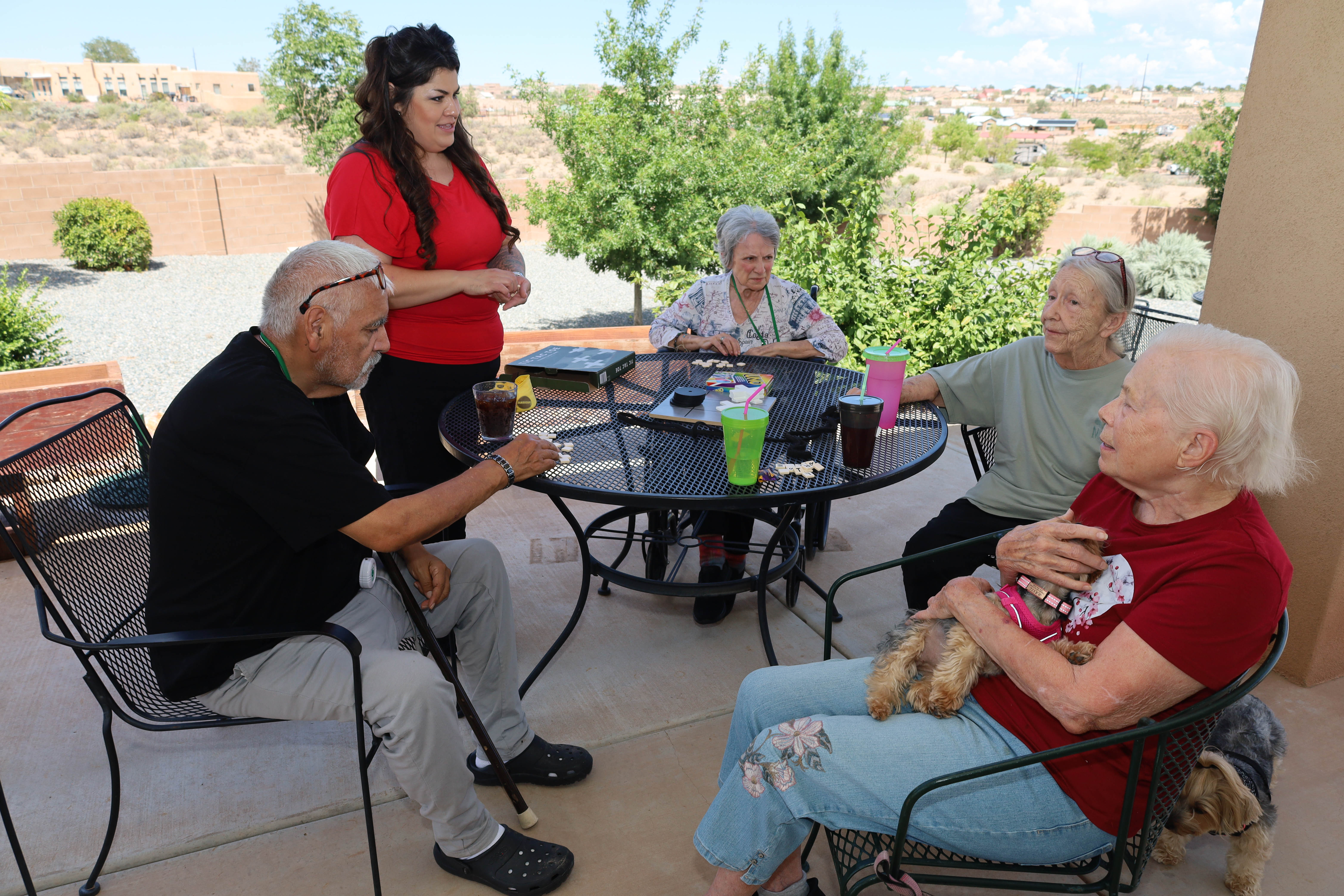 Residents and caregivers sharing an everyday moment at Casita Senior Living