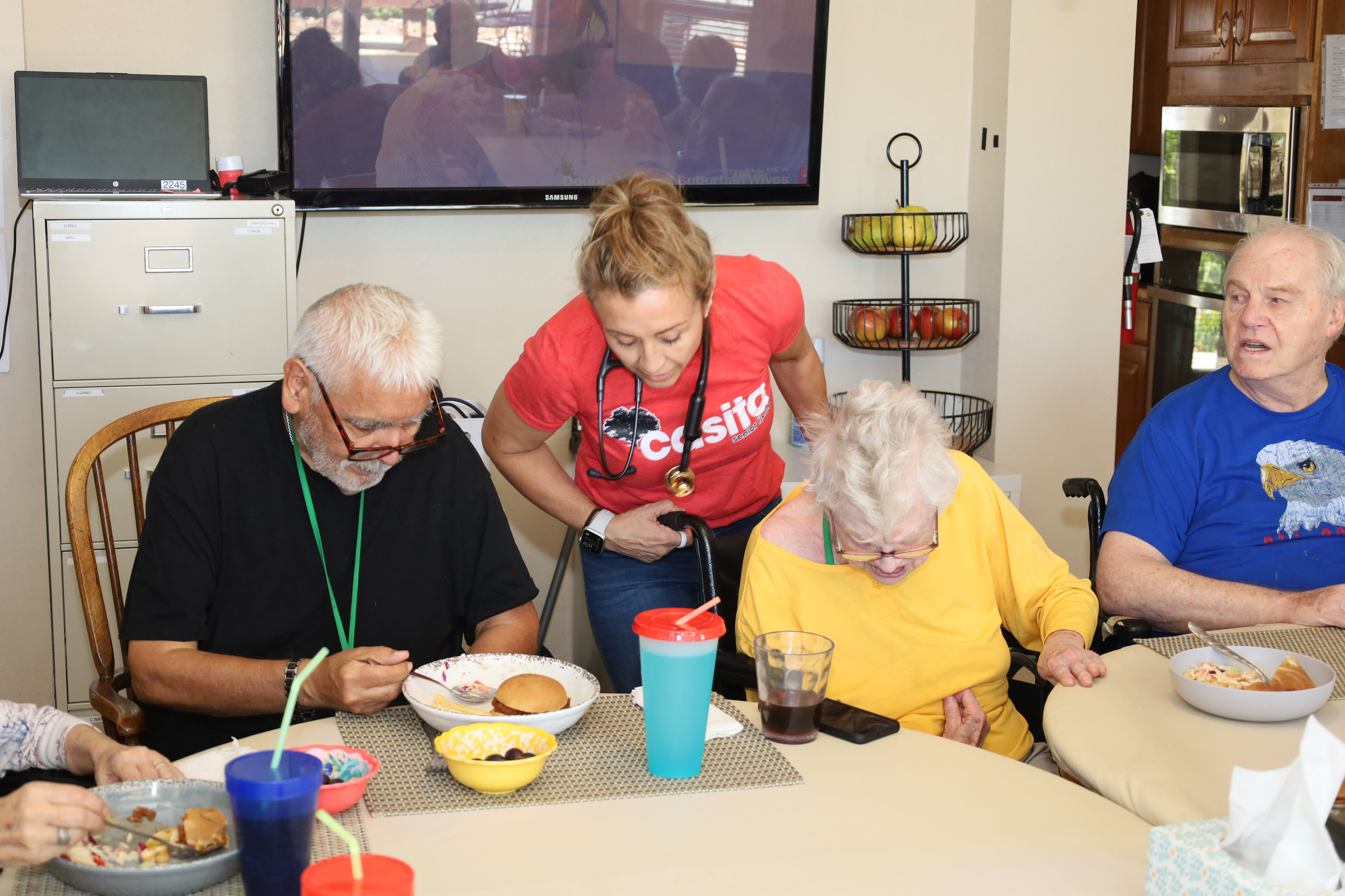 Residents and caregivers sharing an everyday moment at Casita Senior Living