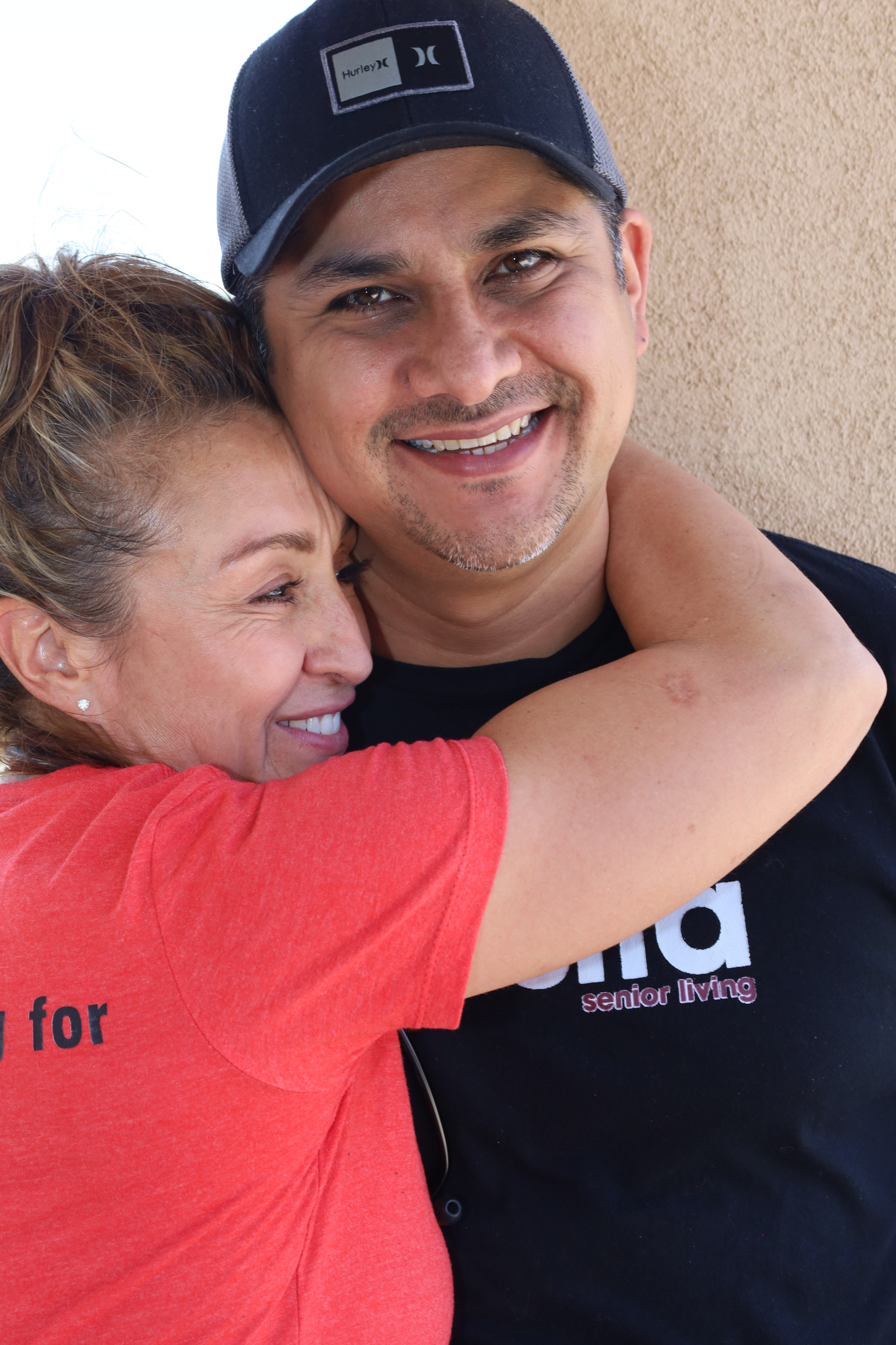 Residents and caregivers sharing an everyday moment at Casita Senior Living