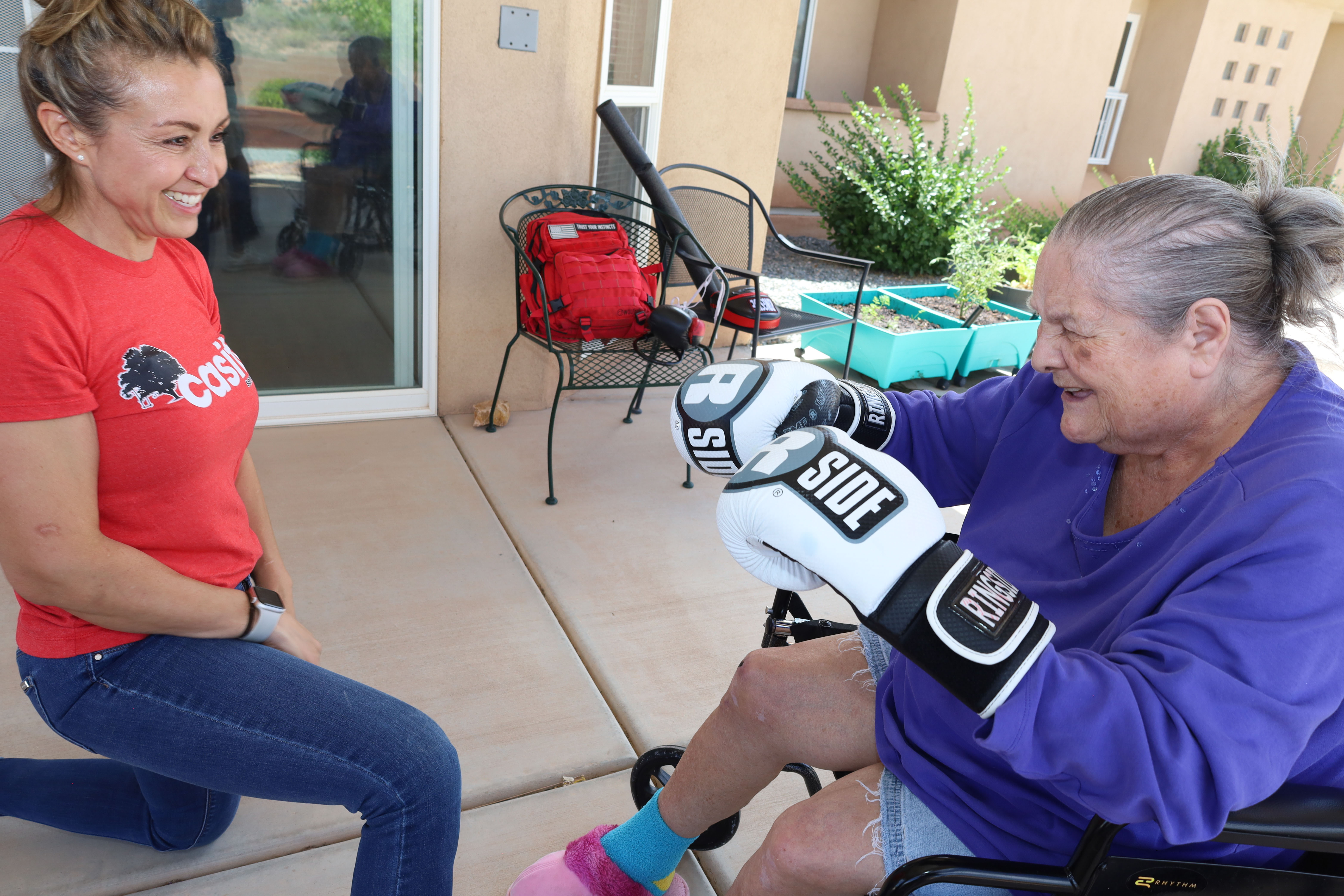Residents and caregivers sharing an everyday moment at Casita Senior Living
