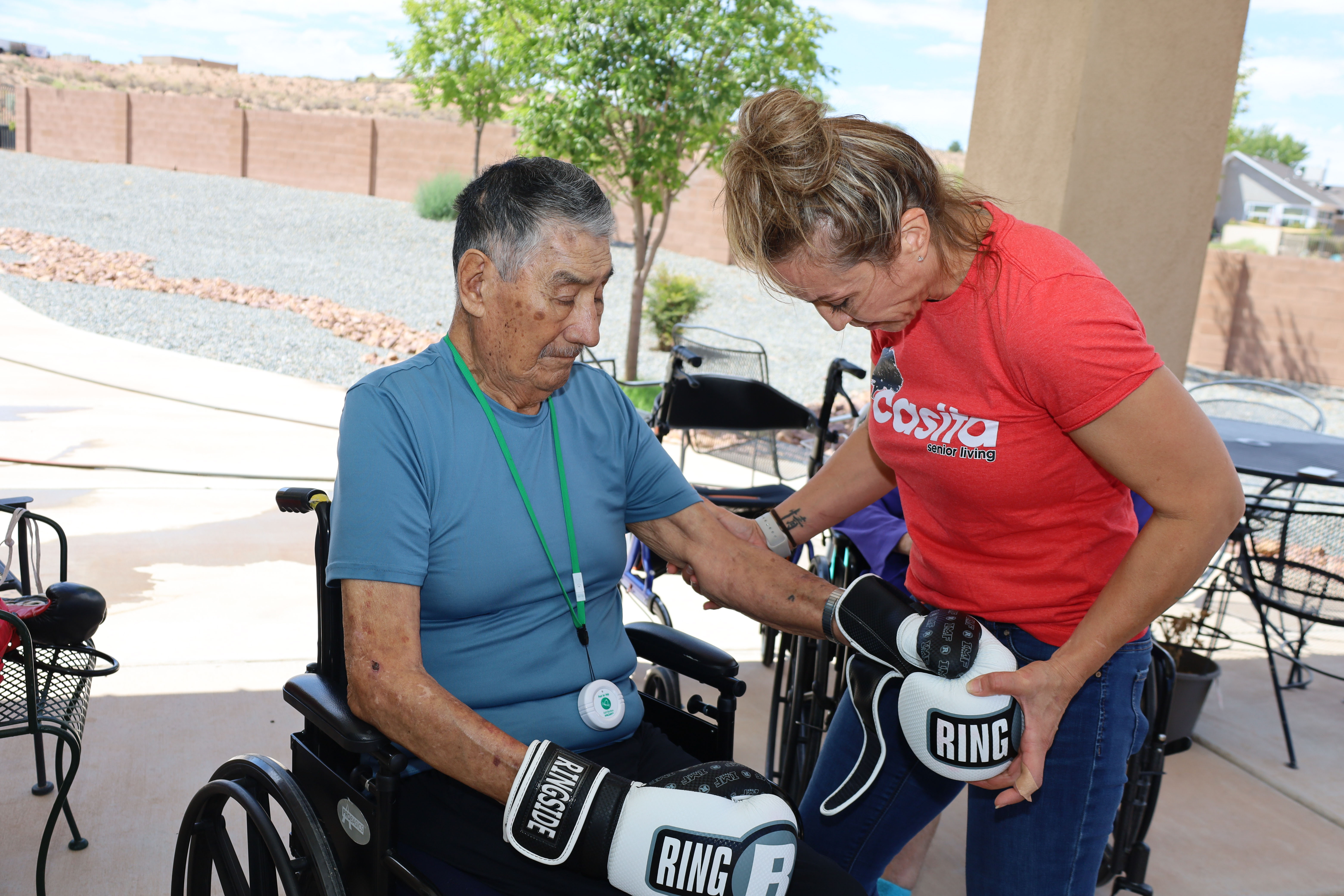 Residents and caregivers sharing an everyday moment at Casita Senior Living