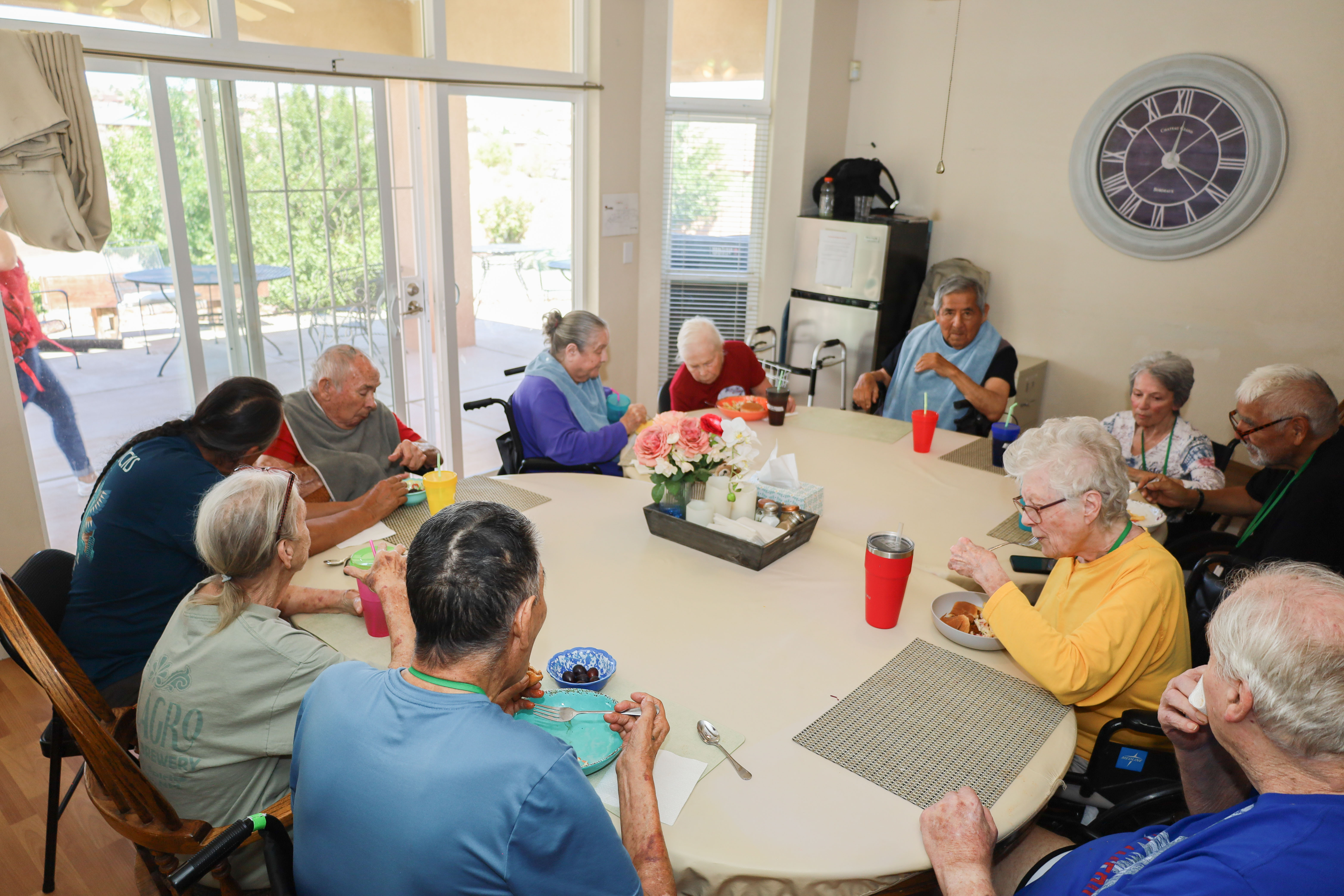 Residents and caregivers sharing an everyday moment at Casita Senior Living