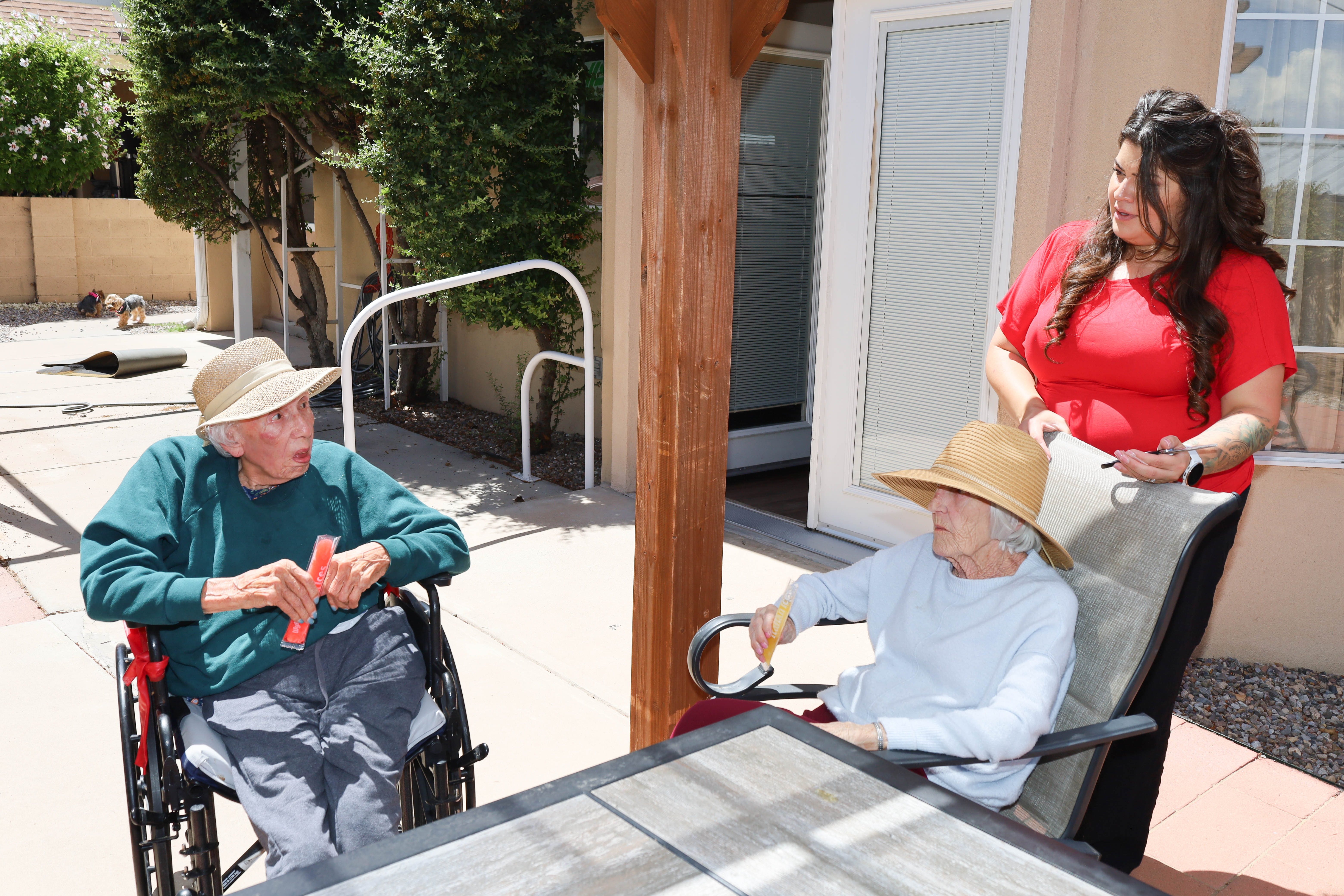 Residents and caregivers sharing an everyday moment at Casita Senior Living