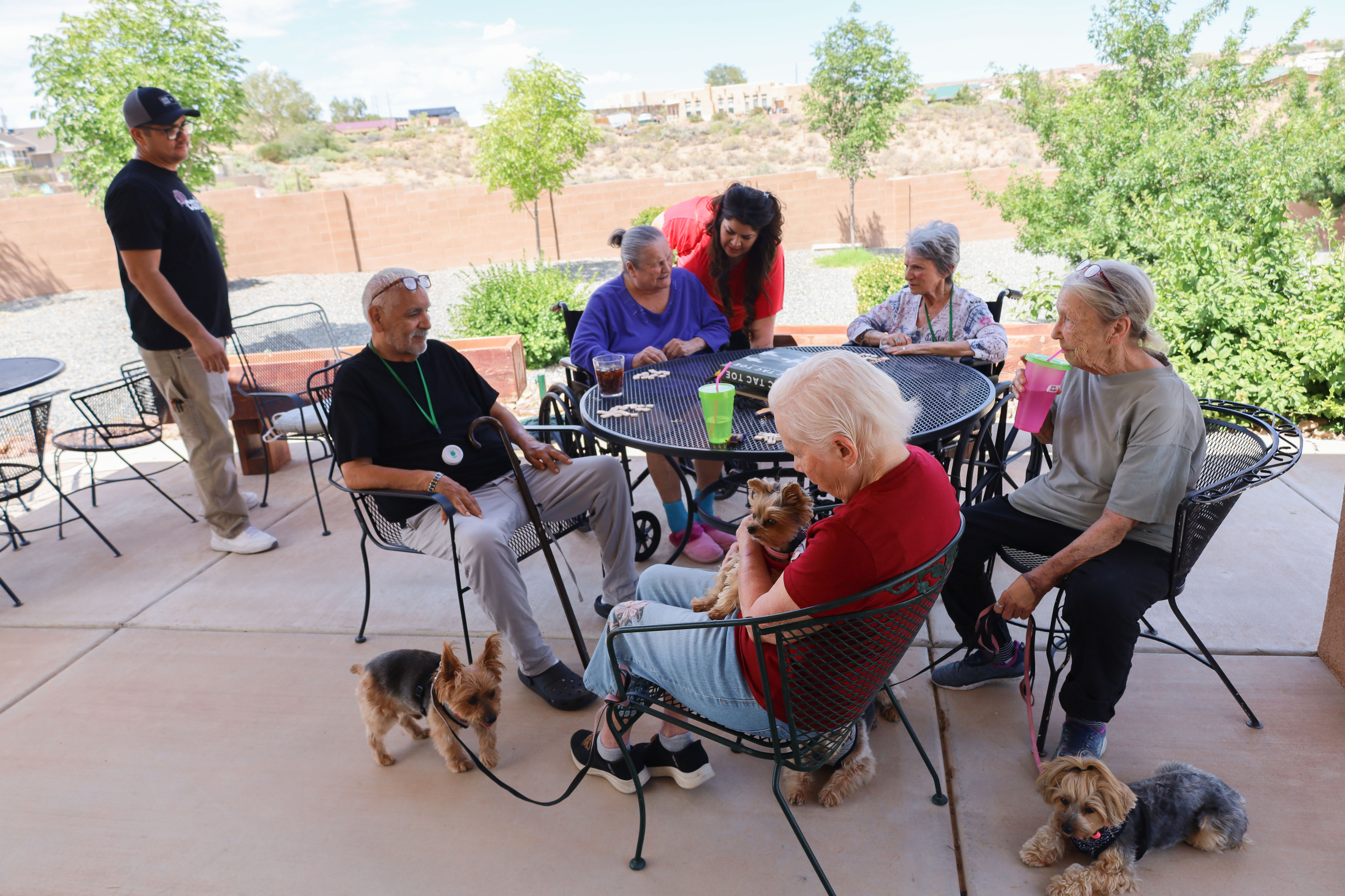Residents and caregivers sharing an everyday moment at Casita Senior Living