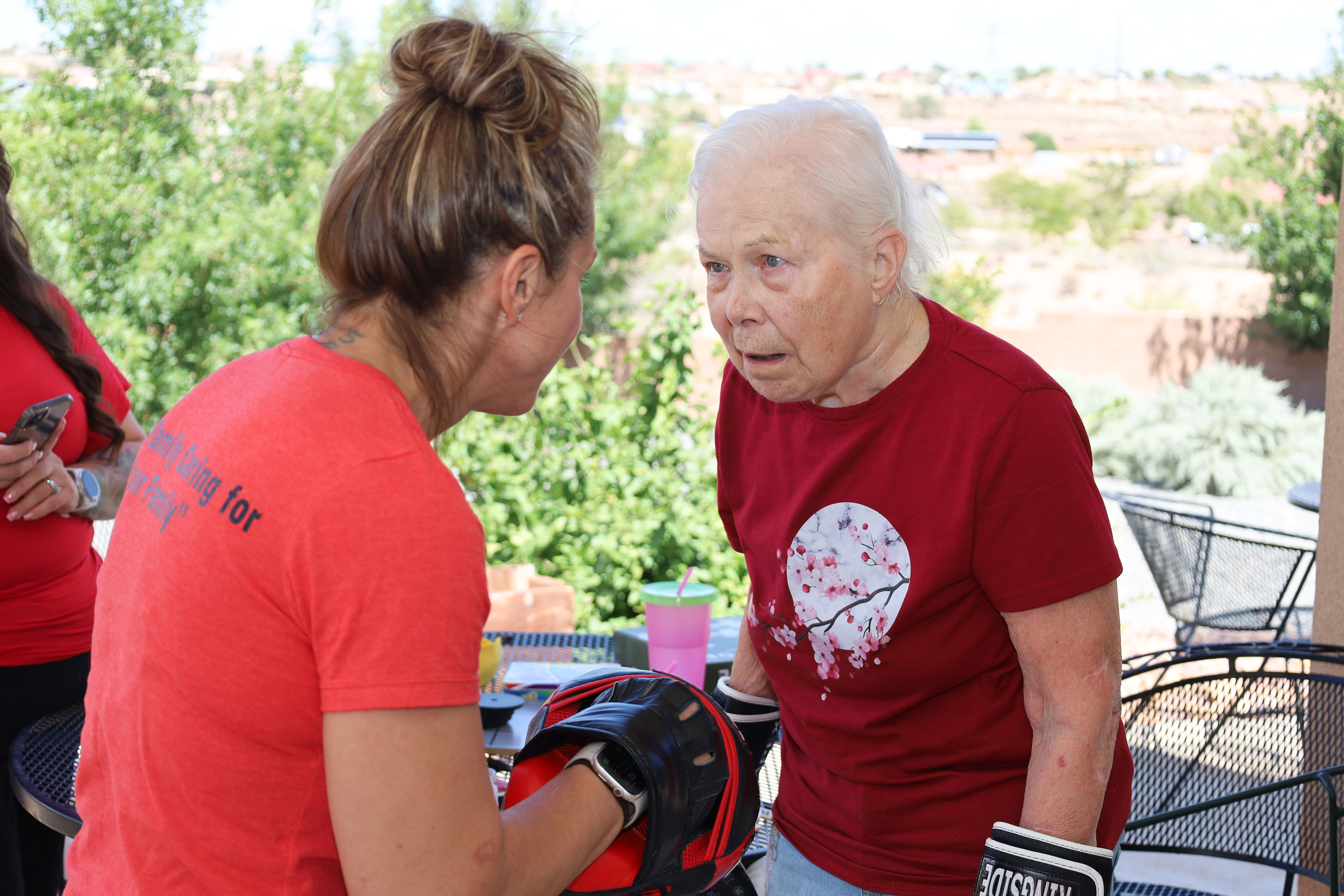 Residents and caregivers sharing an everyday moment at Casita Senior Living